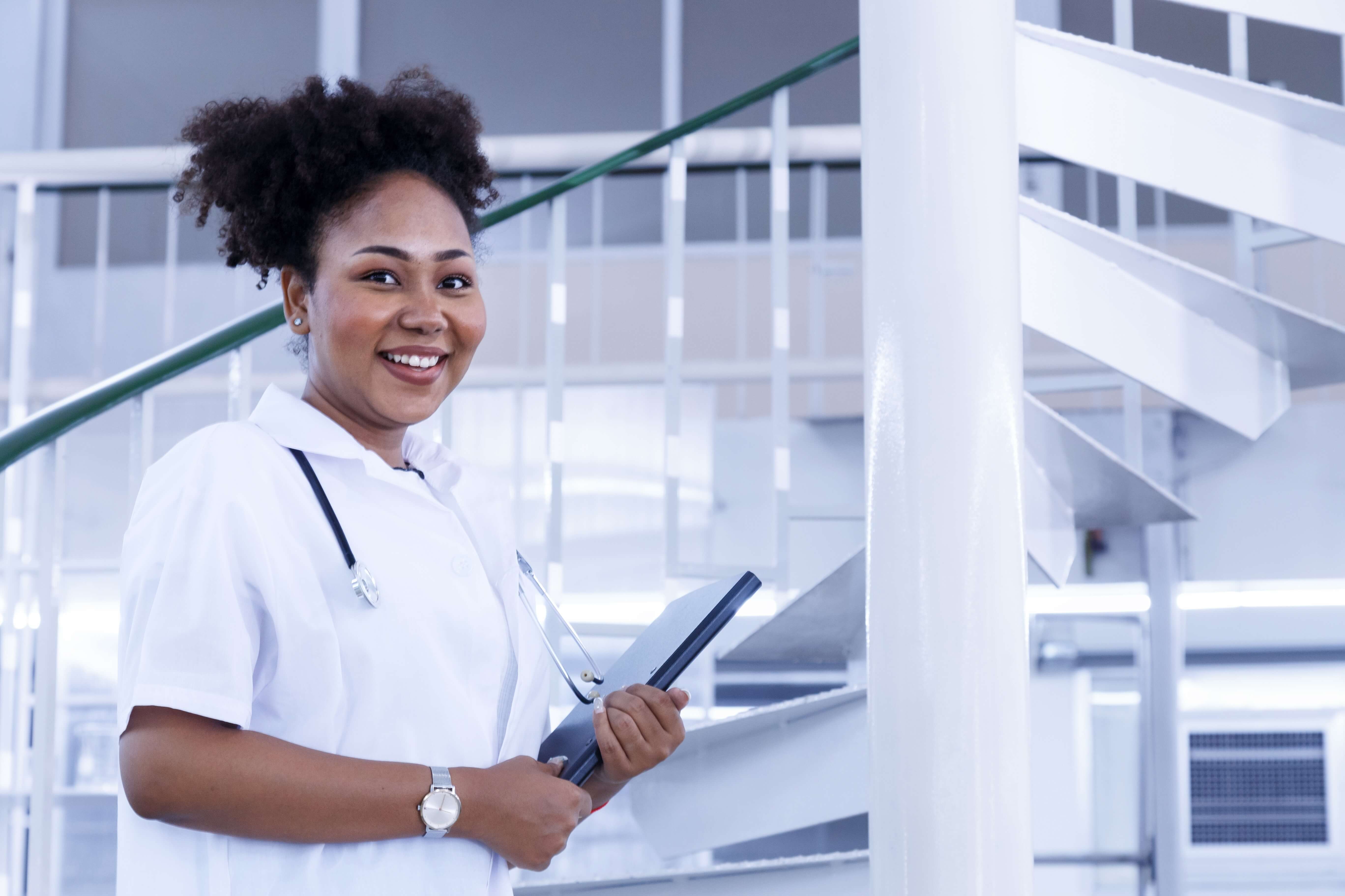 Healthcare professionals greeting a patient