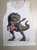 KTT-475: Cool Dino Guitar on a Kid's Tank Top