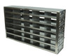 Tall, extra-deep stainless steel freezer rack with six pull-out drawers holding thirty 2-inch cardboard boxes