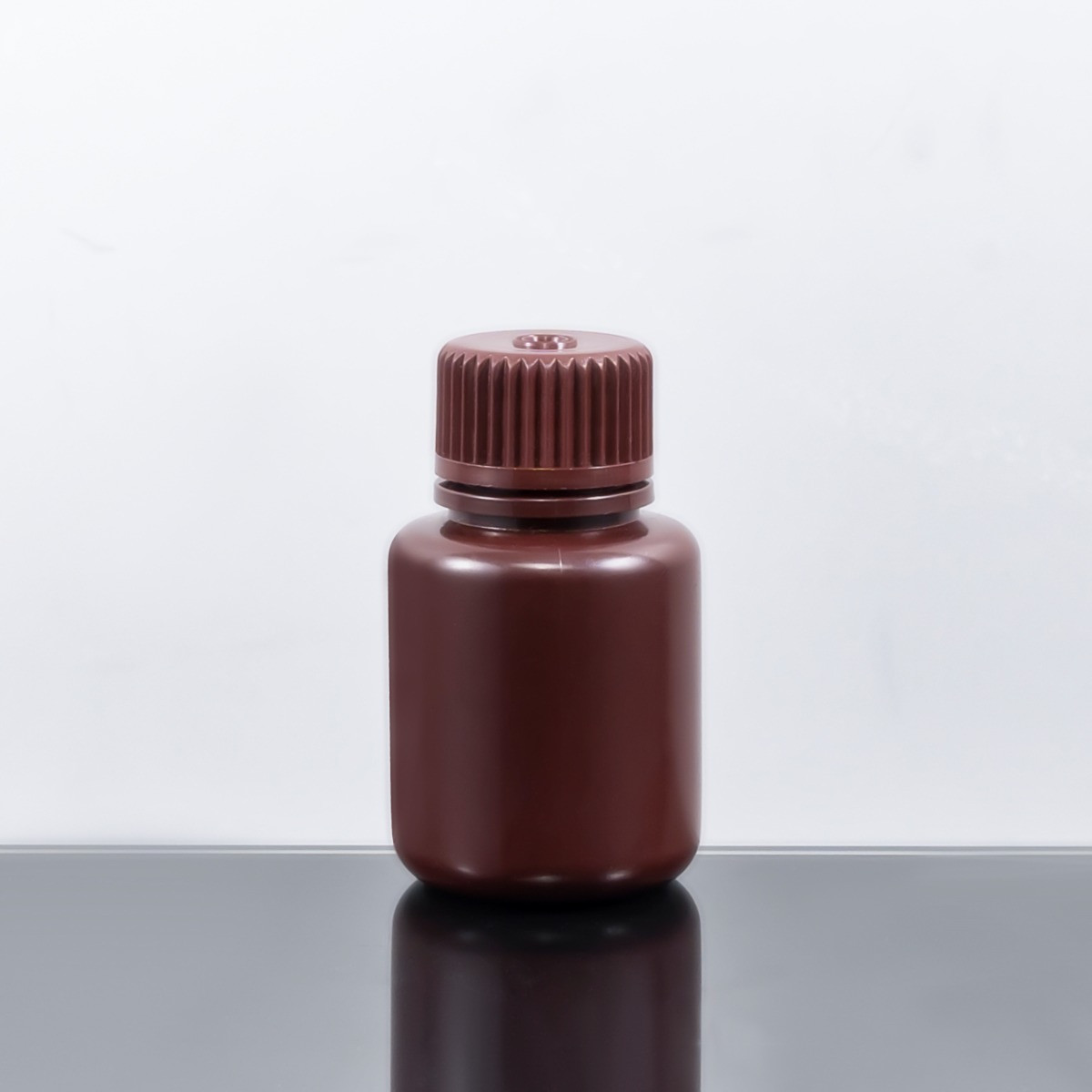 NEST 337303 30 mL Narrow Mouth Round Storage Bottle, Amber HDPE, Sterile, Leakproof Linerless Cap