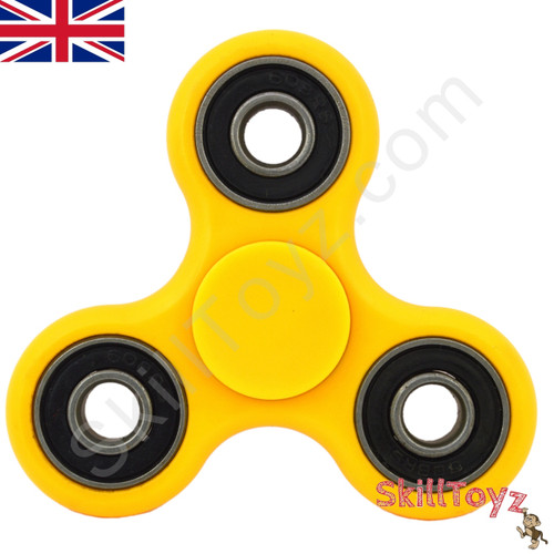 Shown with the supplied yellow finger pads fitted over the centre bearing of the spinner. Ready to play! 