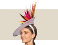White fascinator hat with dramatic multicolor feathers for race day events