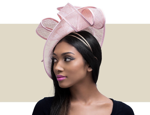 Light pink modern sculptural fascinator hat for weddings and special events