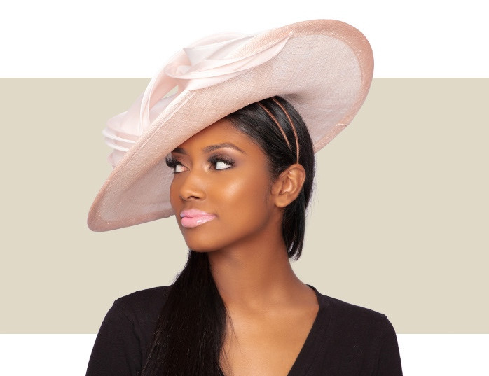 Classic blush pink headpiece for Oaks, weddings, and garden parties