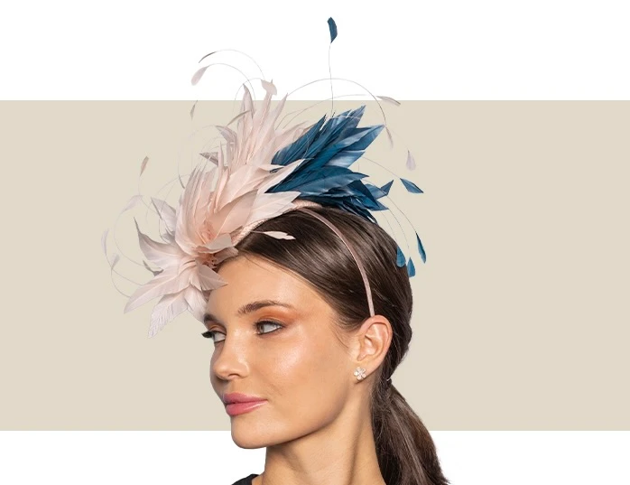 Elegant teal and blush fascinator hat for weddings and special occasions