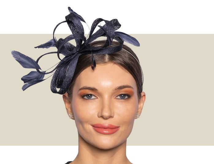 Navy blue wedding guest fascinator with feather detail