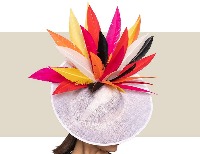 White Royal Ascot statement hat with vibrant multicolor feather spray
