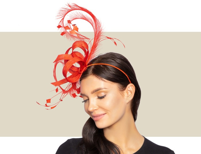 Lightweight burnt orange Derby fascinator with sculptural feather detail