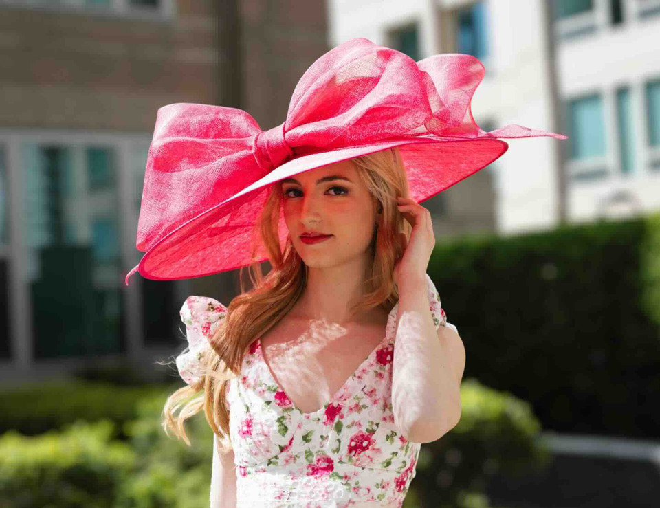 Teaberry pink Kentucky Derby hat with oversized bow and 21.75 inch wide brim