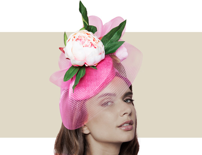 Bright pink Kentucky Oaks hat with large floral peony flower