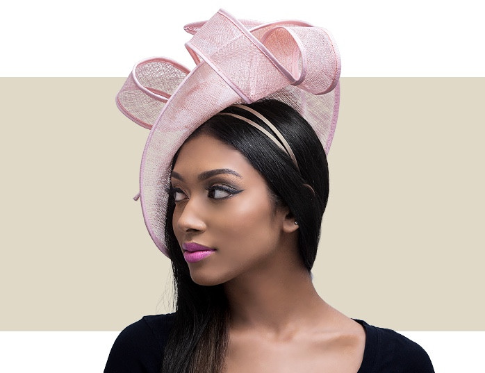 Light pink modern sculptural fascinator hat for weddings and special events
