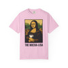 Mocha Lisa Coffee Art Tee in Blossom, pastel pink coffee humor tee featuring Mona Lisa sipping coffee, unisex by Coo Coo’s Coffee.