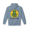 Stone blue hoodie showcasing Coo Coo’s Coffee zen graphic. Features meditating gecko Bert in a peaceful pose with “Inner Bean. Outer Zen. Brew Good Vibes” text.