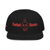 Black snapback with bold red embroidery – skull graphic and “Fueled by Beans” text, coffee lover streetwear hat by Coo Coo’s Coffee.