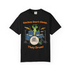 Black tee with gecko drummer graphic and headline text—high-contrast music tee.