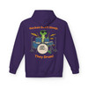 “Purple hoodie with Bert the gecko playing drums illustration and slogan ‘Geckos Don’t Sleep, They Drum!,’ Hoodie by Coo Coo’s Coffee.”