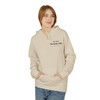 Model wearing sand hoodie, front view, ‘For Every Kid.’ chest print