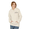 Person wearing cream Every Bead Tells a Story hoodie from Coo Coo’s Coffee.