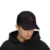 Happy Face dad hat in black worn by model - red embroidered Coo Coos Coffee smiley icon - Yupoong 6245CM unstructured cap