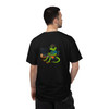 $ make coffee tee — front shows fake compiler output in terminal green: command prompt, progress bar at 60%, three build steps (compiling beans, linking espresso, building dreams), and "warning: morning incomplete" punchline; back features Computer Bert at his laptop — Coo Coo's Coffee Tech Error 404 collection two-sided DTG tee on dark cotton. back male model
