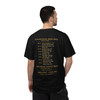 Back of the Bert & the Bean Shredders tee — a classic band tour back print: "Pour Decisions Were Made — Tour 2026" over a list of coffee-pun tour dates and venues (the Bean Machine Arena, Crema Coliseum, Caffeine Cathedral and more), with special guests SBOF and "Fresh Roast — Loud Life" — Coo Coo's Coffee tour merch.