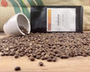 Guatemala roasted coffee beans, bag and cupping cup