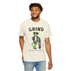 Person wearing the Grind coffee t-shirt from Coo Coo’s Coffee, ivory