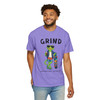 Person wearing the Grind coffee t-shirt from Coo Coo’s Coffee, violet