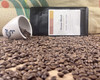 House blend coffee beans, bag and cupping cup