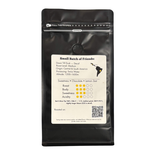 Back label of Dawn Till Dusk Decaf coffee showing tasting notes, roast info and QR code