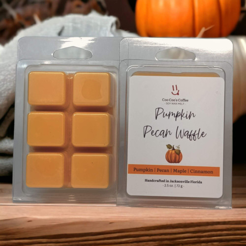 Pumpkin Pecan Waffle wax melt cubes in clamshell with autumn accents for cozy home fragrance