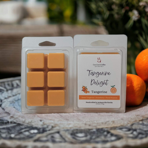 Tangerine Delight Wax Melt pack displayed beside fresh tangerines and rustic décor, highlighting juicy citrus vibes.