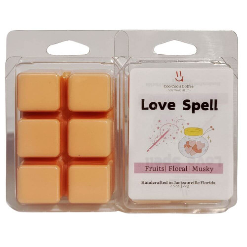 "Love Spell wax melt clamshell pack with peach-colored cubes – fruity, floral, and musky fragrance blend by Candles by Christie."