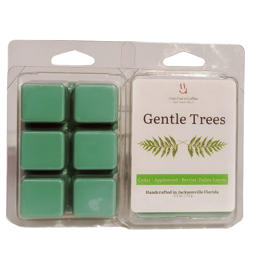 "Gentle Trees Wax Melt by Candles by Christie – six green wax cubes in clamshell packaging with label featuring cedar, applewood, and forest foliage notes."