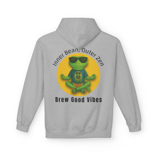 Back view of sand-colored hoodie featuring Bert the gecko in meditation pose with sunglasses, surrounded by a yellow sun circle. Text reads “Inner Bean. Outer Zen. Brew Good Vibes” – Coo Coo’s Coffee zen hoodie design.