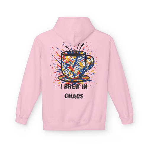 “I Brew in Chaos Coffee Hoodie in Light Pink – playful coffee hoodie with chaotic abstract mug design. Cozy and fun streetwear by Coo Coo’s Coffee.”