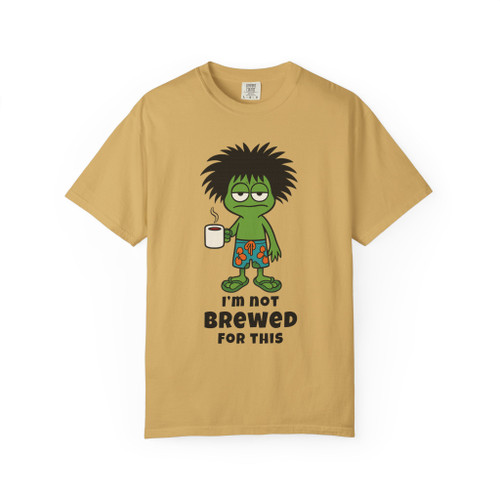 mustard tee with frazzled green gecko (Bert) holding coffee cup and text “I’m Not Brewed for This” – funny coffee shirt by Coo Coo’s Coffee
