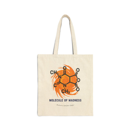 cotton tote bag with caffeine molecule and swirling orange background, text reads “Molecule of Madness – Fueled by Coo Coo’s Coffee”