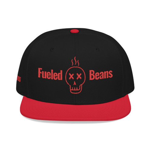 Red/Black/Black snapback hat with striking Fueled by Beans skull embroidery – bold coffee streetwear by Coo Coo’s Coffee.