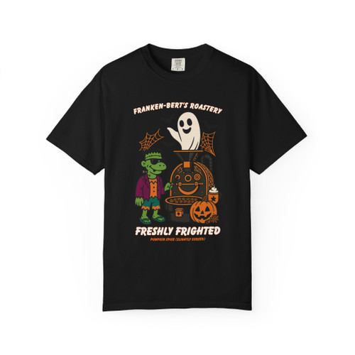 “Boo Brew at Bert’s Roastery – Freshly Frighted Tee by Coo Coo’s Coffee in black. Halloween-themed graphic with Franken-Bert, ghost, roaster, pumpkin, and bats.”