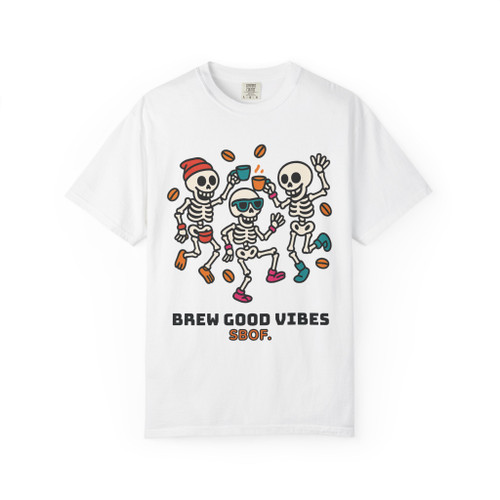 “White t-shirt with three dancing skeletons in colorful shoes and hats surrounded by coffee beans, text reads ‘Brew Good Vibes – Coo Coo’s Coffee.’”