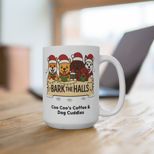 Bark the Halls holiday dog lover mug from Coo Coo’s Coffee on a wooden table in a cozy workspace