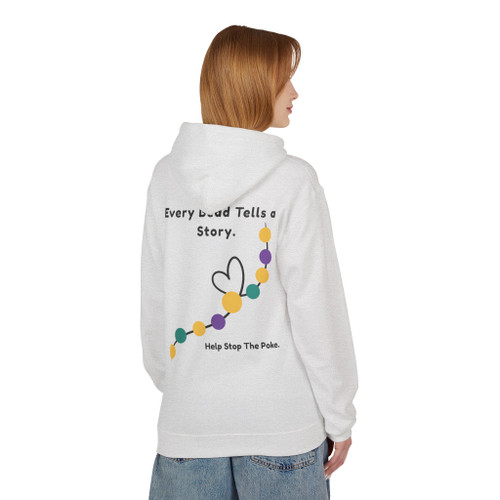 Person wearing Every Bead Tells a Story hoodie showing bravery bead heart graphic on back
