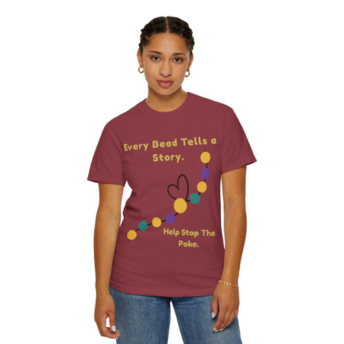 Model wearing maroon Every Bead Tells a Story donation tee, front view