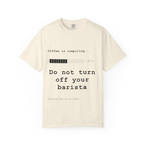 Do Not Turn Off Your Barista tee - monospace text reading Coffee is compiling 47 percent Do not turn off your barista - front print on light blue ring-spun cotton by Coo Coos Coffee Florida Brew Crew