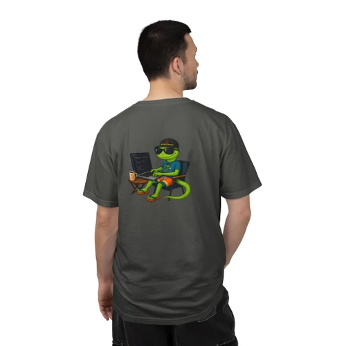 $ make coffee tee — front shows fake compiler output in terminal green: command prompt, progress bar at 60%, three build steps (compiling beans, linking espresso, building dreams), and "warning: morning incomplete" punchline; back features Computer Bert at his laptop — Coo Coo's Coffee Tech Error 404 collection two-sided DTG tee on dark cotton. Pepper back view model