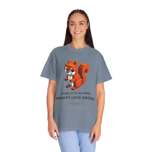 Mighty Love Grows Tribute Tee Blue Jean $5.00 donation to childhood cancer. Female model