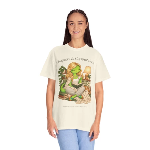 Person wearing the Chapters & Cappuccinos light coffee t-shirt from Coo Coo’s Coffee, female ivory