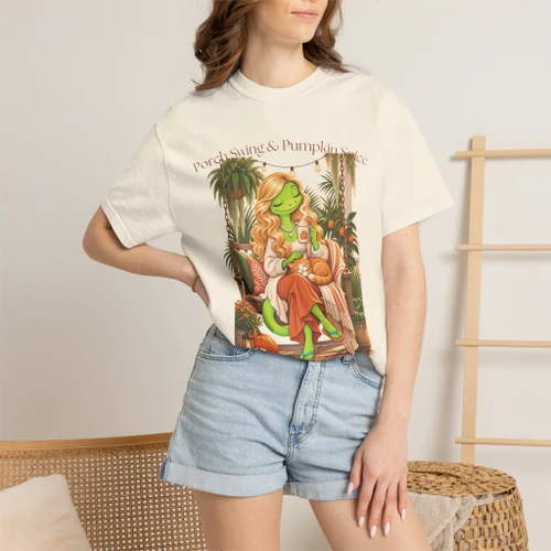 Close-up of the cozy porch swing and pumpkin-spice, warm autumn art graphic print on the Porch Swings & Pumpkin Spice t-shirt, ivory