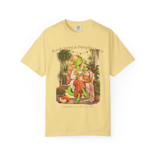 Porch Swings & Pumpkin Spice coffee t-shirt — cozy porch swing and pumpkin-spice, warm autumn art printed on the front, butter